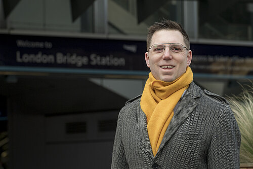 Rob Blackie pictured wearing a yellow scarf