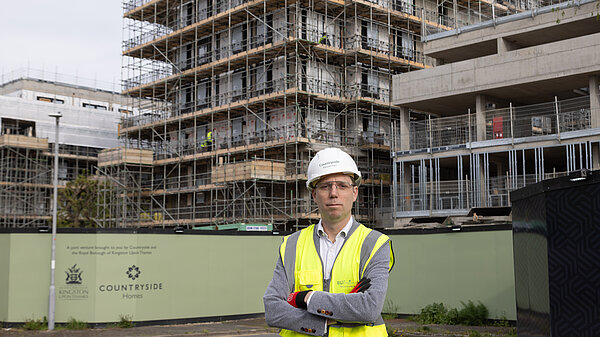 Rob Blackie pictured in a hi-vis with a white hardhat 