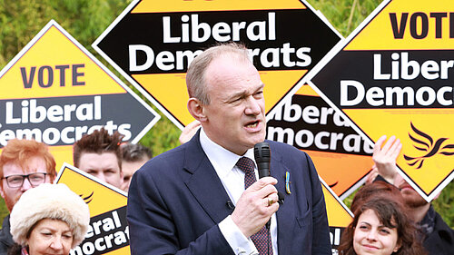Ed Davey Ed Davey in front of a crowd holding Liberal Democrat posters